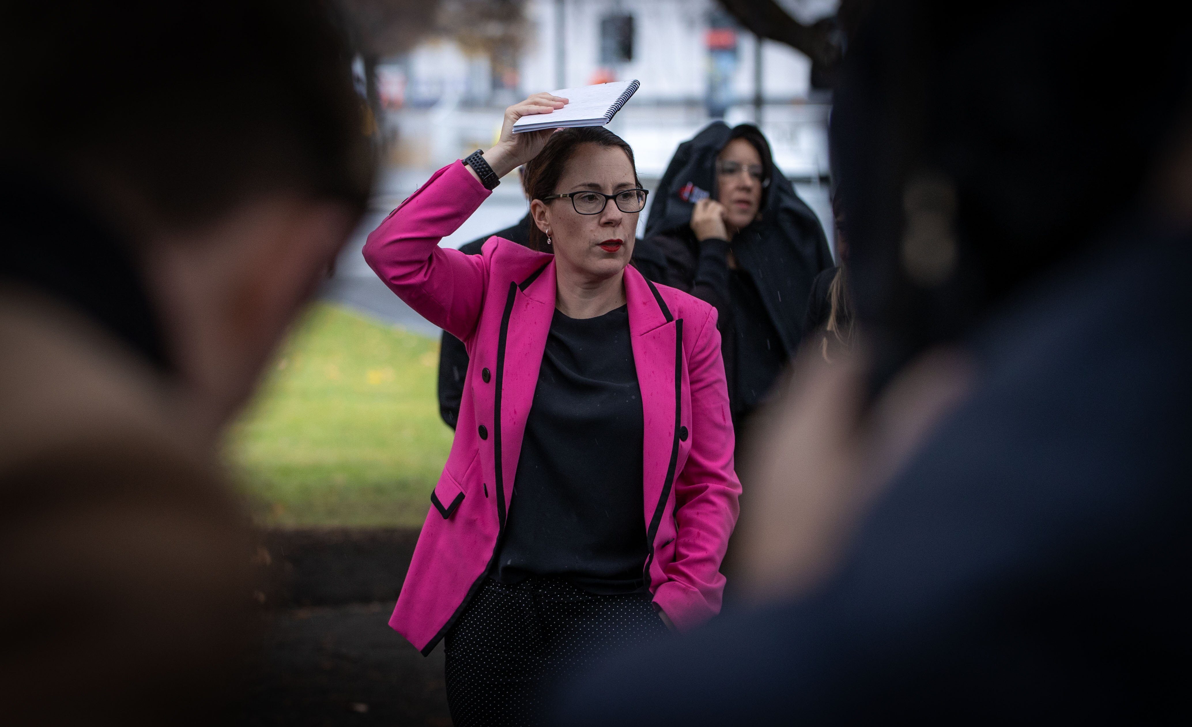 Jessica Munday giving a press conference.