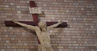 A crucifix on the wall of a church.
