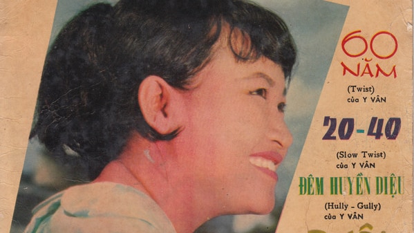 A picture of an LP album cover. Side profile of Phuong Tam who is young and smiling.