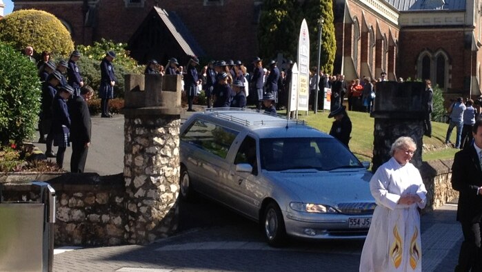 Students from Ms Baden-Clay's old school, Ipswich Girls' Grammar, formed a guard of honour as her coffin was driven away.