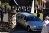 Students from Ms Baden-Clay's old school, Ipswich Girls' Grammar, formed a guard of honour as her coffin was driven away.
