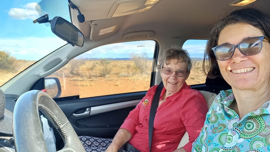two women in a car. 