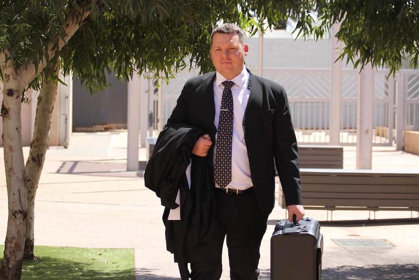 Defence lawyer Will Reid leaving Kalgoorlie Courthouse.