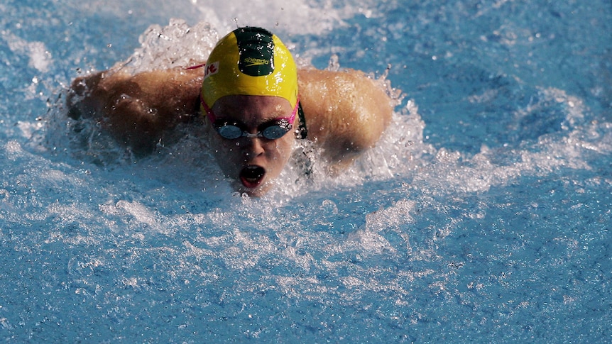 Danni Miatke competes in the women's 50m butterfly heats in 2007