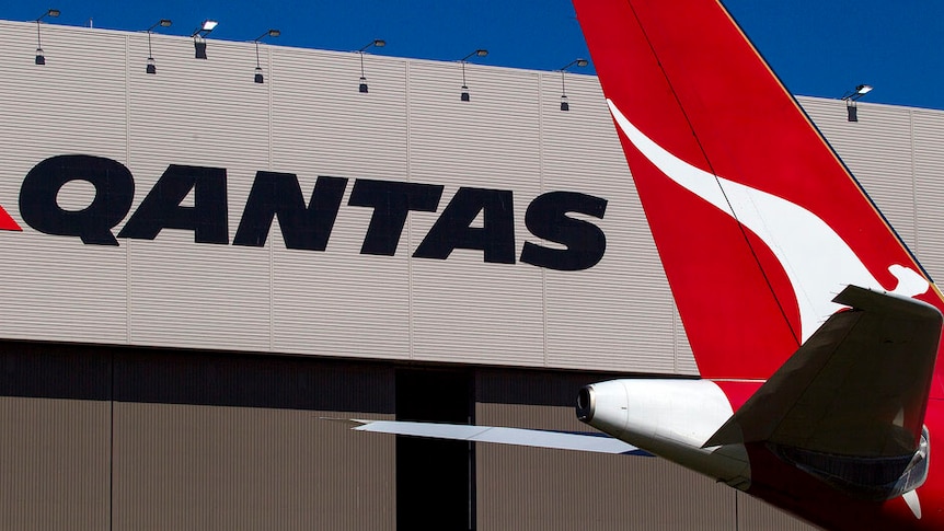 Qantas plane outside hangar