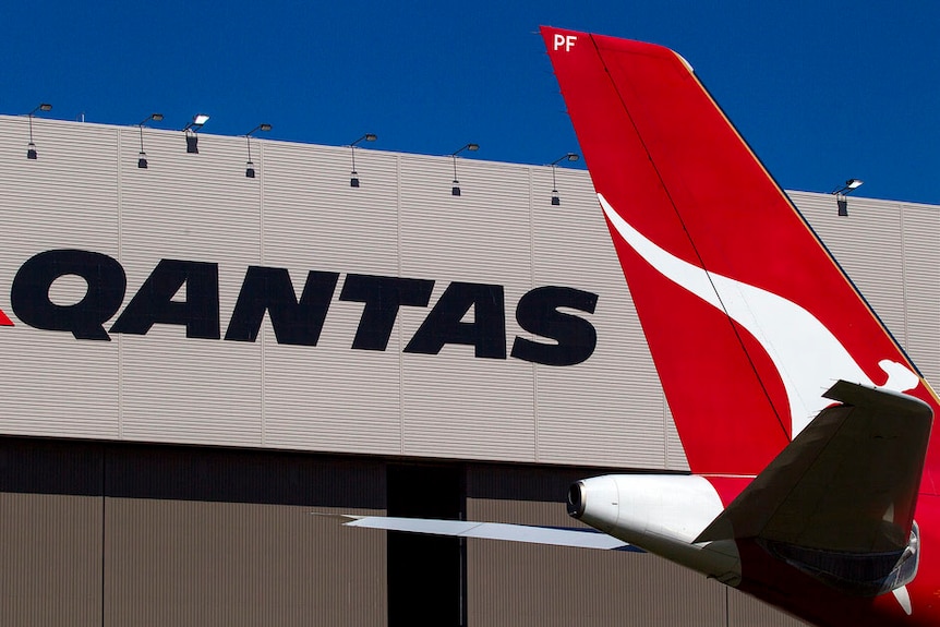 Qantas plane outside hangar