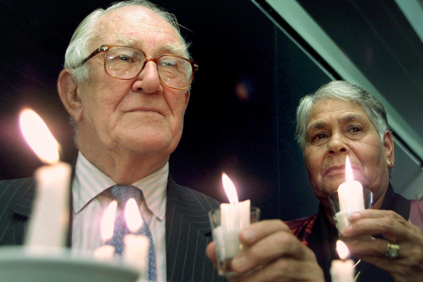 Malcolm Fraser and Lowitja O'Donoghue with symbolic candles