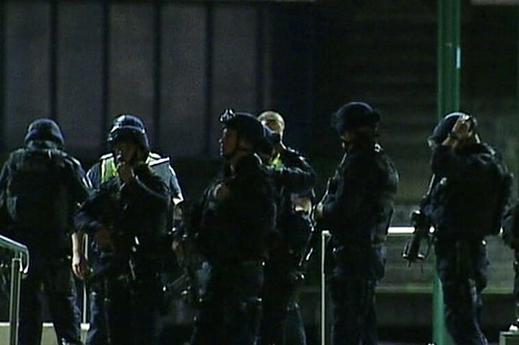 Police attend the scene of an armed siege at Southbank in Melbourne