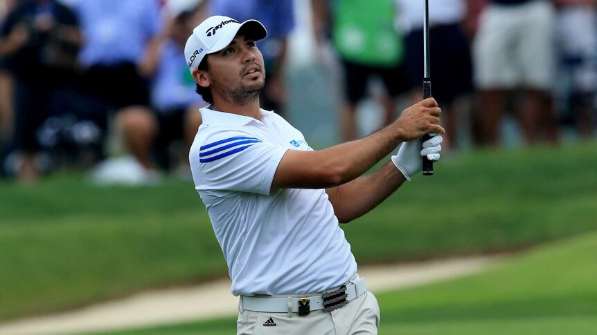 Jason Day chips at the PGA Championship