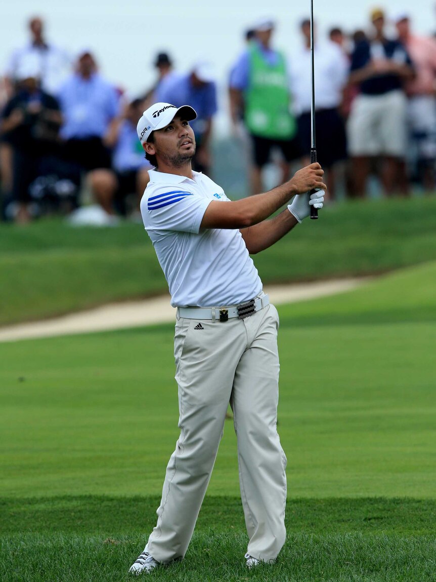 Jason Day chips at the PGA Championship