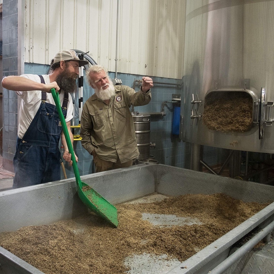 Chris Moore and Bruce Pascoe in the brewery.