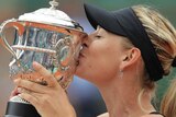 Maria Sharapova kisses the French Open trophy.
