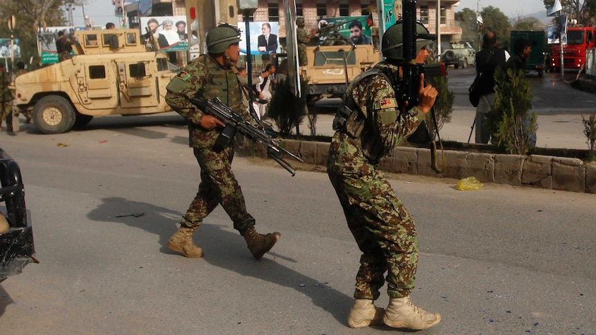 Taliban suicide attack kills 11 people at police station in Afghanistan