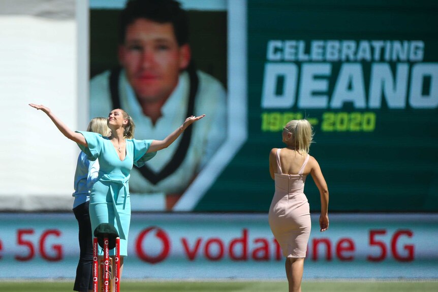 Phoebe, Augusta and Jane Jones walk on the MCG turf during a ceremony remembering Dean Jones during the Boxing Day Test.