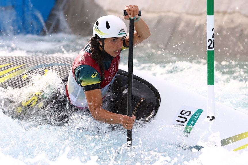 An Australian canoe slalom athletes competes at the Tokyo Olympics.