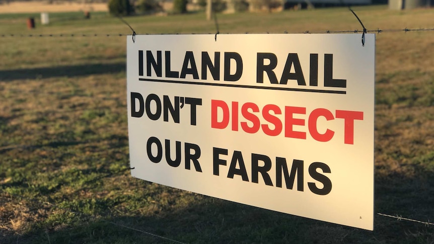 Sign reads: Inland Rail: Don't dissect our farms