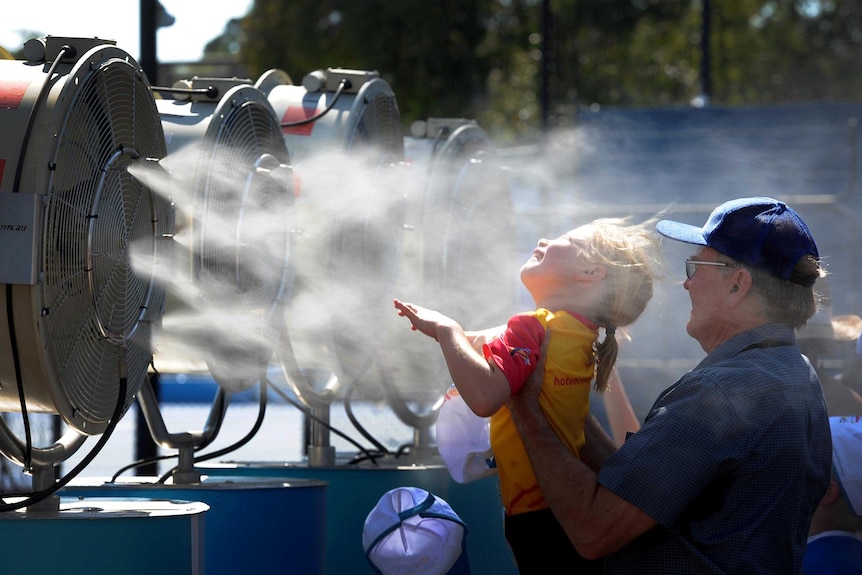 Tennis fans cool off at the Australian Open.