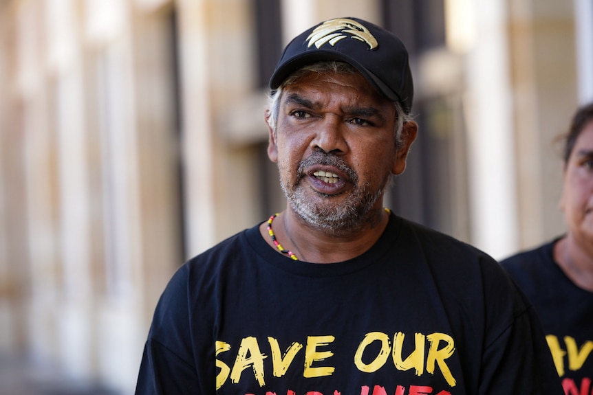 A man wearing a cap