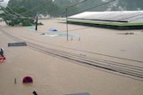 Floodwaters cover Nadi as torrential rain falls.