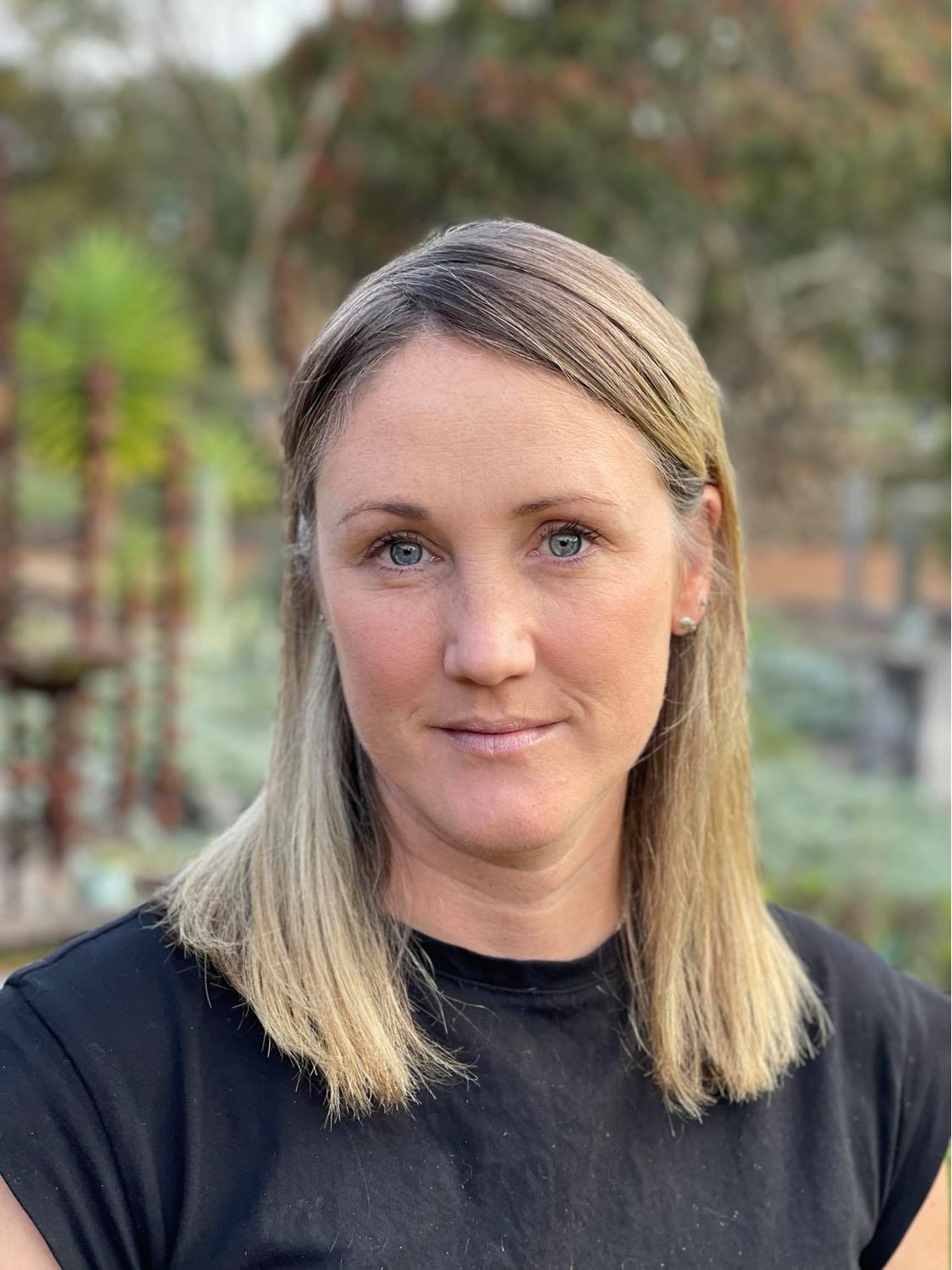 A close up of her face looking at the camera