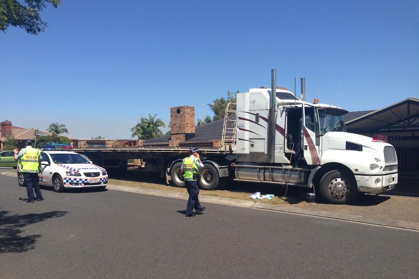 Abandoned stolen semi-trailer after it hit a fence at Runcorn, south of Brisbane, on October 7, 2013