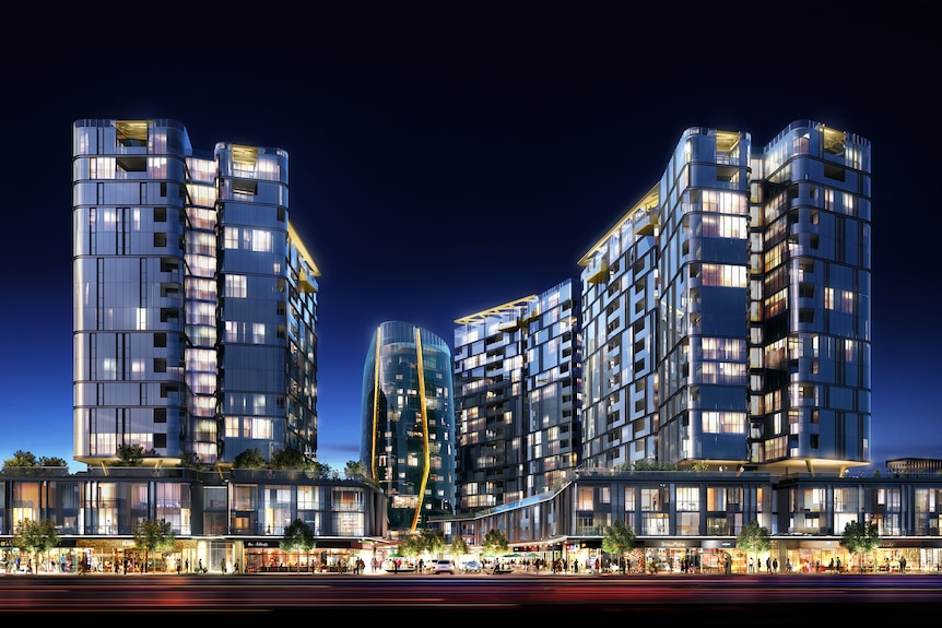 Artists nighttime impression of Nova city with lit up high-rise buildings against a blue sky