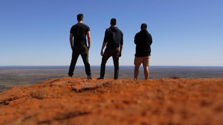 Uluru climbers charged under Environment Protection and Conservation Act