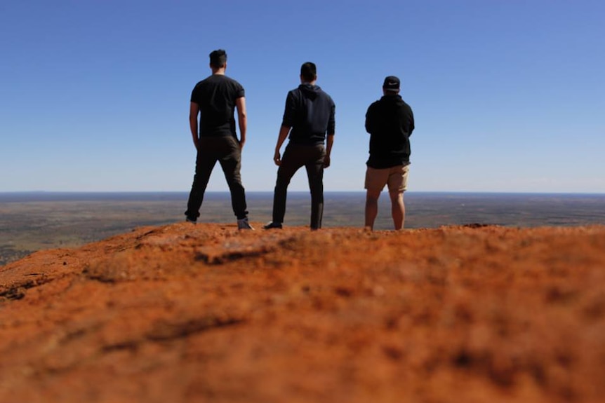 Uluru climbers charged under Environment Protection and Conservation Act