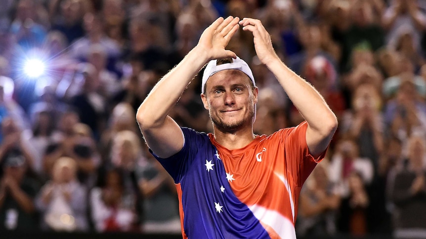Amazing career ... Lleyton Hewitt reacts to the crowd following his loss to David Ferrer
