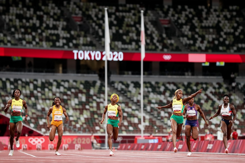 Women racing in the 100m sprint at the Olympics