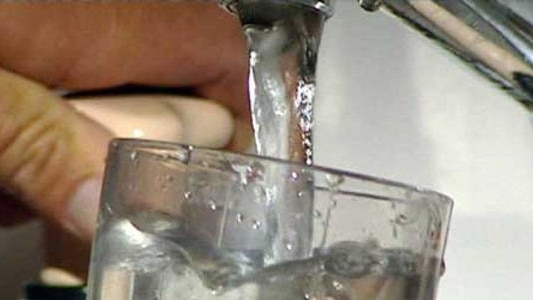 Water coming out of tap.