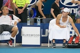 Hewitt and Stosur lose doubles
