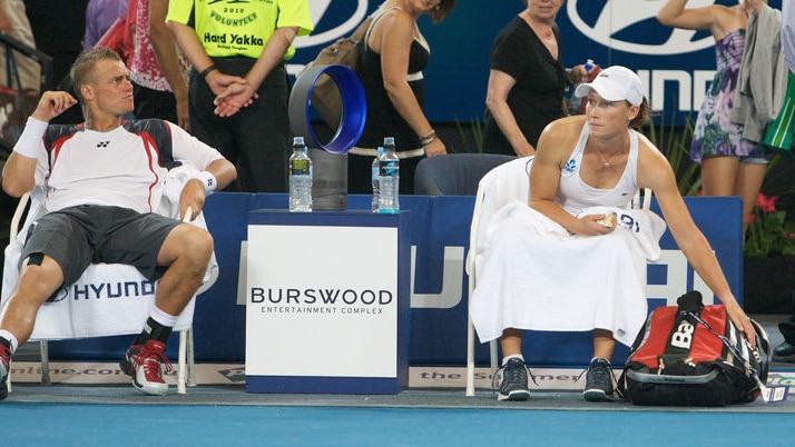 Hewitt and Stosur lose doubles