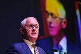 Malcolm Turnbull speaking at a microphone