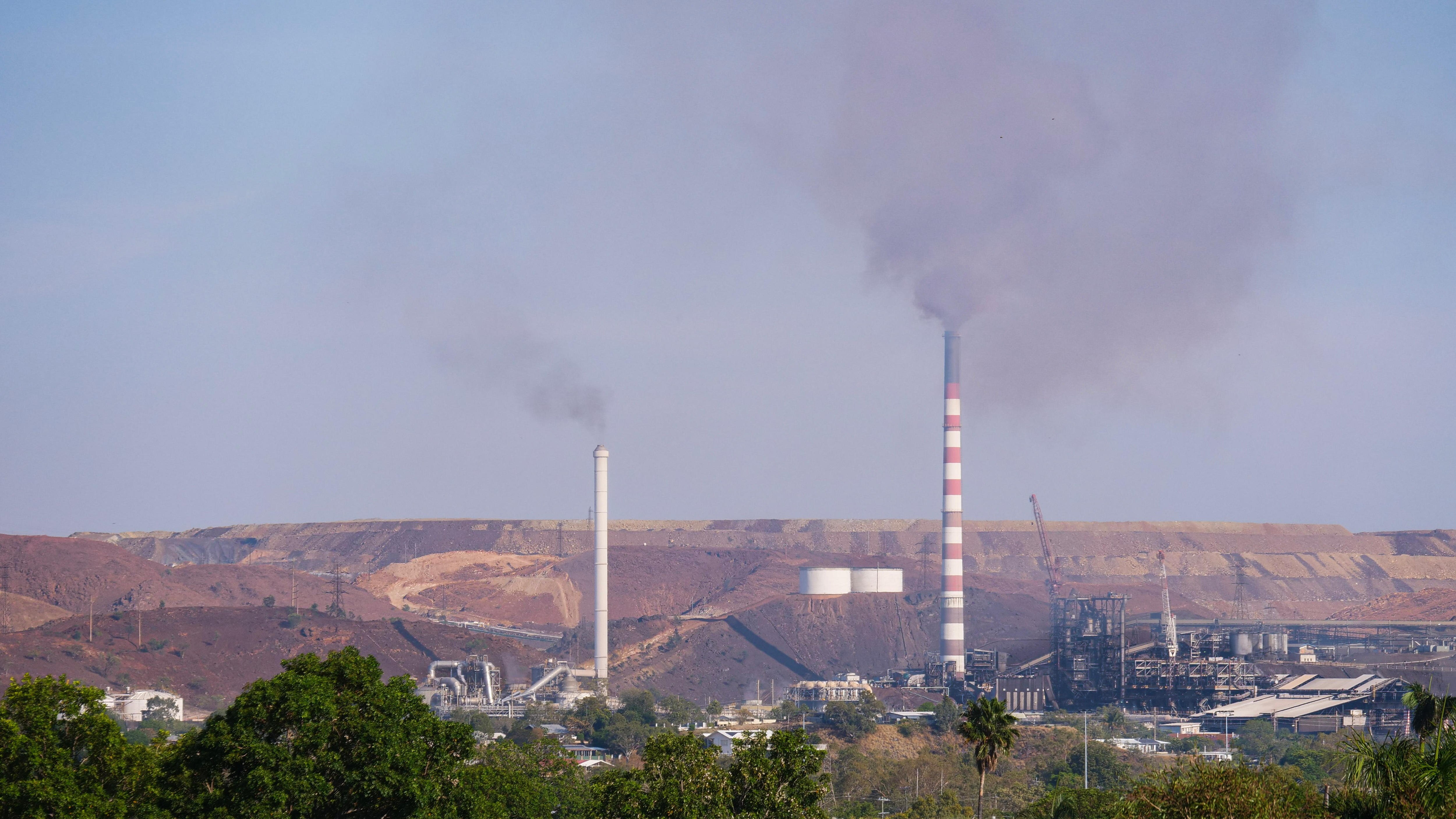 Two mining stacks in the distance.