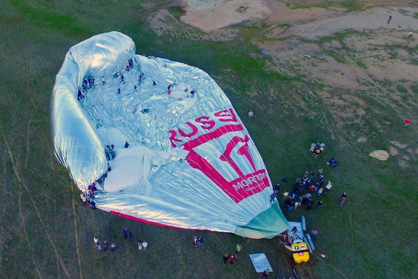 Fedor Konyukhov balloon with crowd after landing