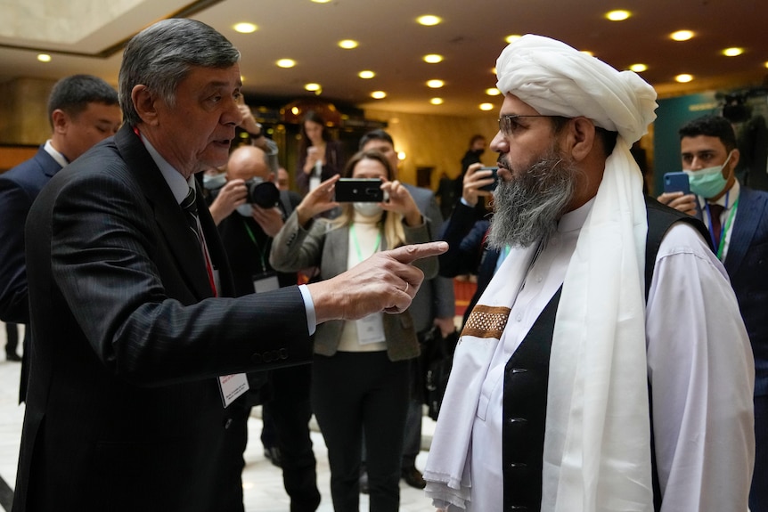 Russian presidential envoy to Afghanistan Zamir Kabulov speaks to a member of political delegation from the Afghan.