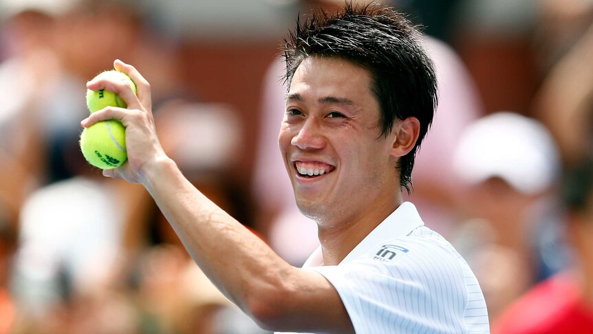 Japan's Kei Nishikori celebrates after beating American Wayne Odesnik at the US Open.