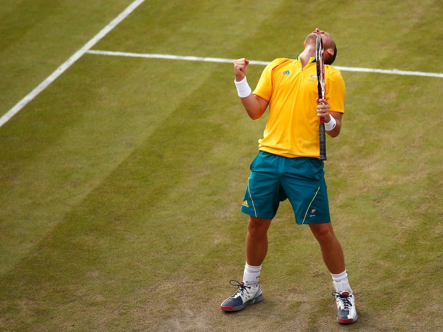 Lleyton Hewitt celebrates defeating Marin Cilic during the London 2012 Olympic Games.