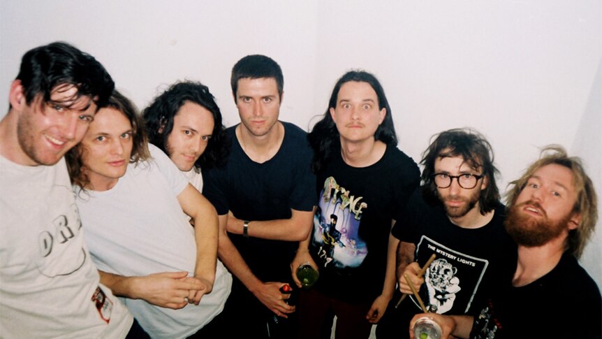 A 2017 press shot of King Gizzard and the Lizard Wizard