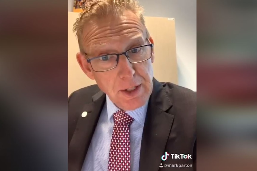 A screenshot of Mark Parton speaking to the camera as part of a video.