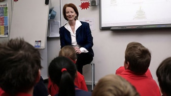 File photo:Julia Gillard, then Federal Education Minister, visits Boroondara Park Primary School (AAP: Luis Enrique Ascui)