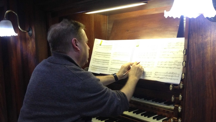 Organist Andrew Bainbridge preparing for a recital