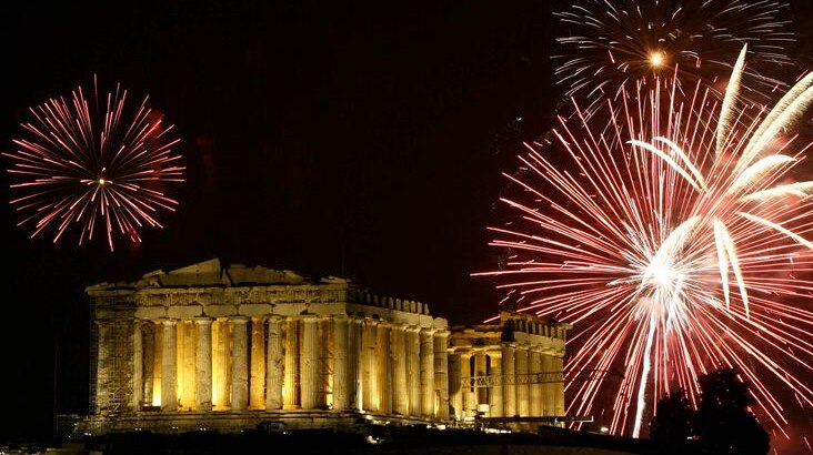 Fireworks explode over the Parthenon atop the Acropolis