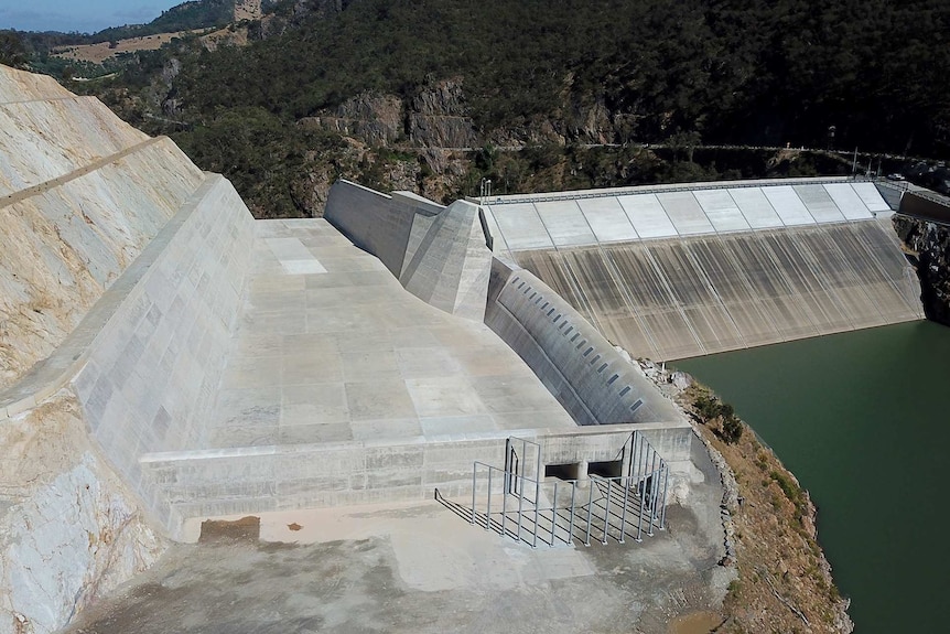 A photo of a dam, taken from a high vantage point.