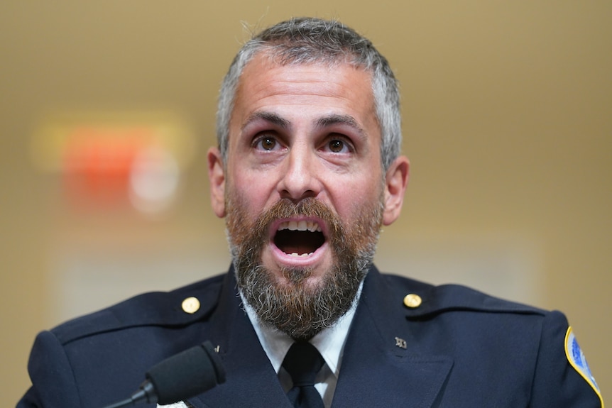 Metro police officer Michael Fanone appears angry as he testifies in front of the House select committee