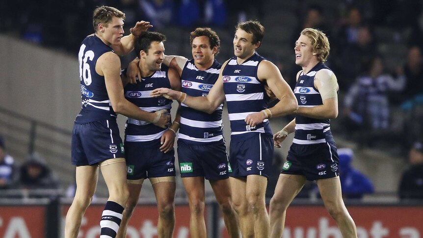 On song ... The Cats celebrate a goal during their win over the Kangaroos