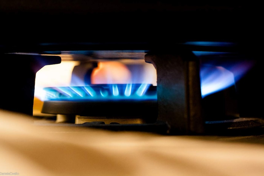 Cooking on a gas stove.