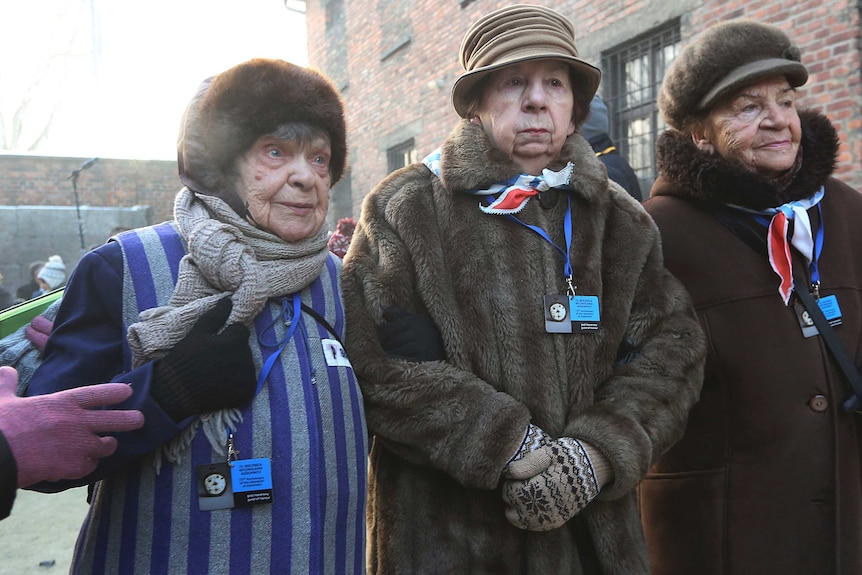 Holocaust survivors commemorate people killed by the Nazis at the former Auschwitz Germany Nazi death camp