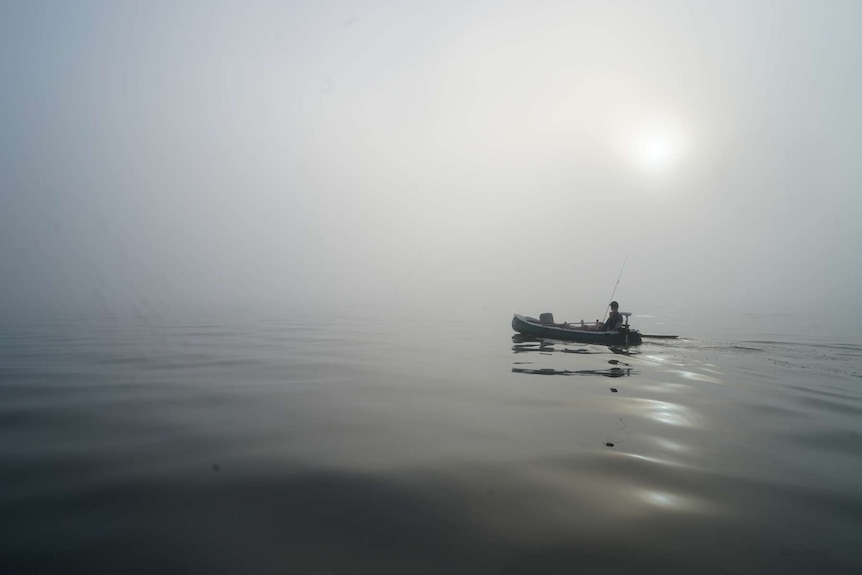 Matt Golinski on his canoe on the Lake Cootharabah.